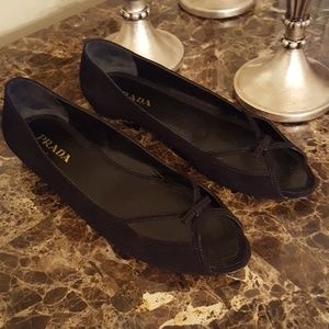 Prada open toe slip ons